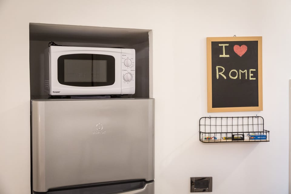 microwave, freezer and fridge