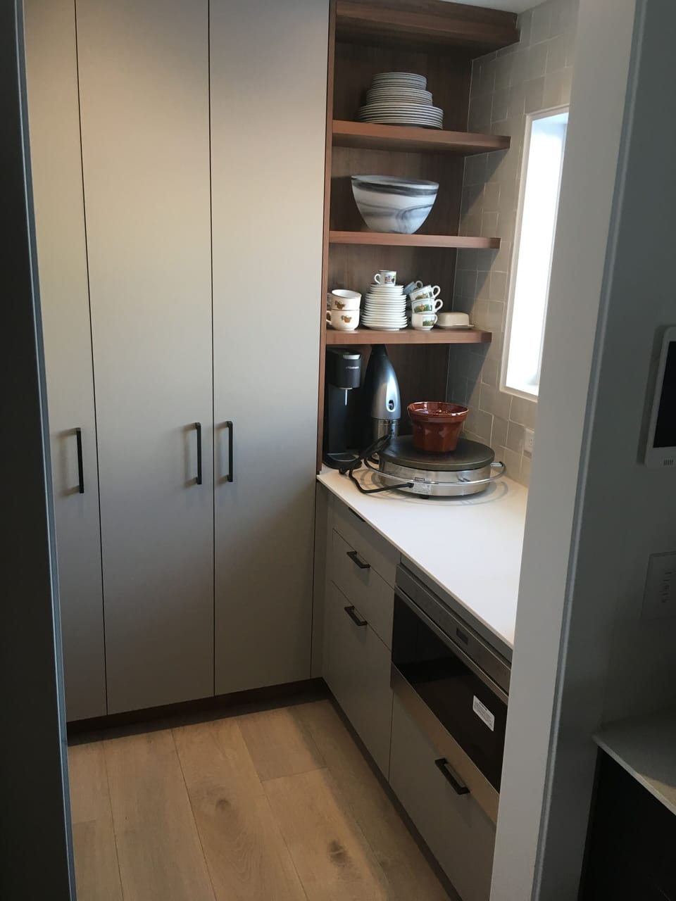 butlers pantry with a drawer microwave