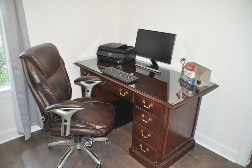Desk with printer. 