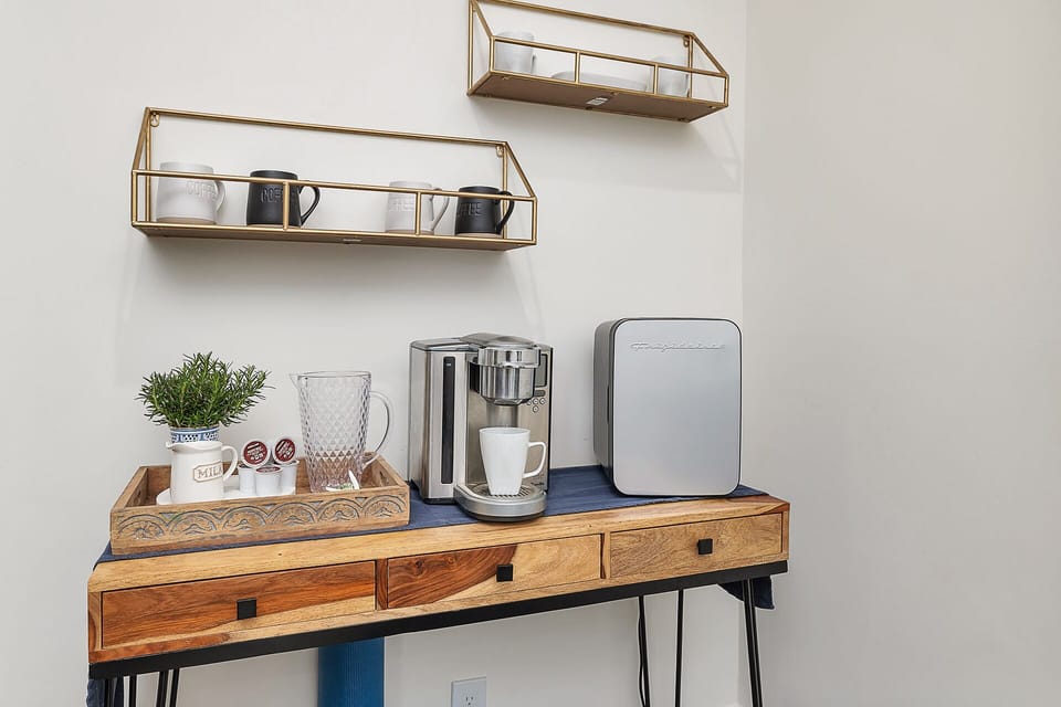 Coffee bar in media room, outside of 2 upstairs bedrooms. 