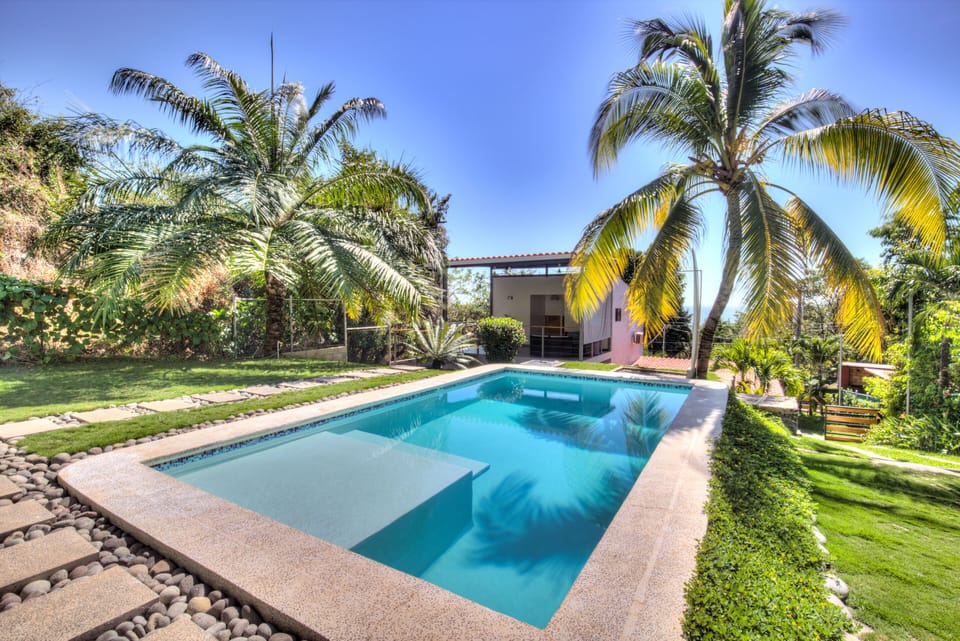 The pool and casitas at One Wave  Surf Villa 
