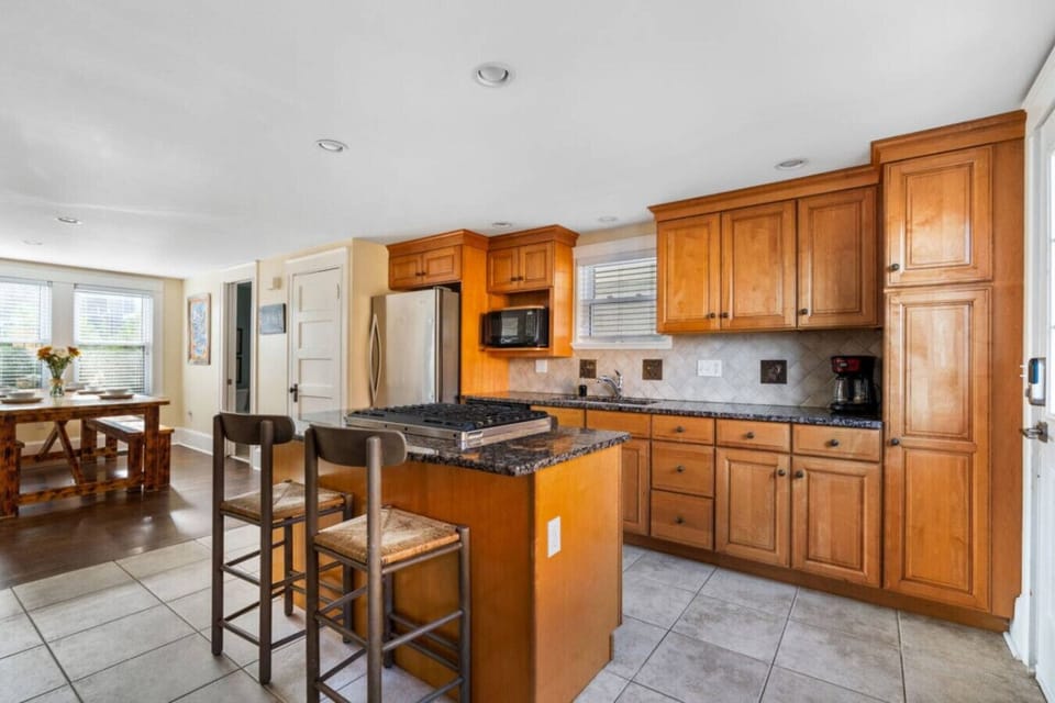 Kitchen - 1st Floor - Propane range, Eat in Bar, Stocked Kitchen