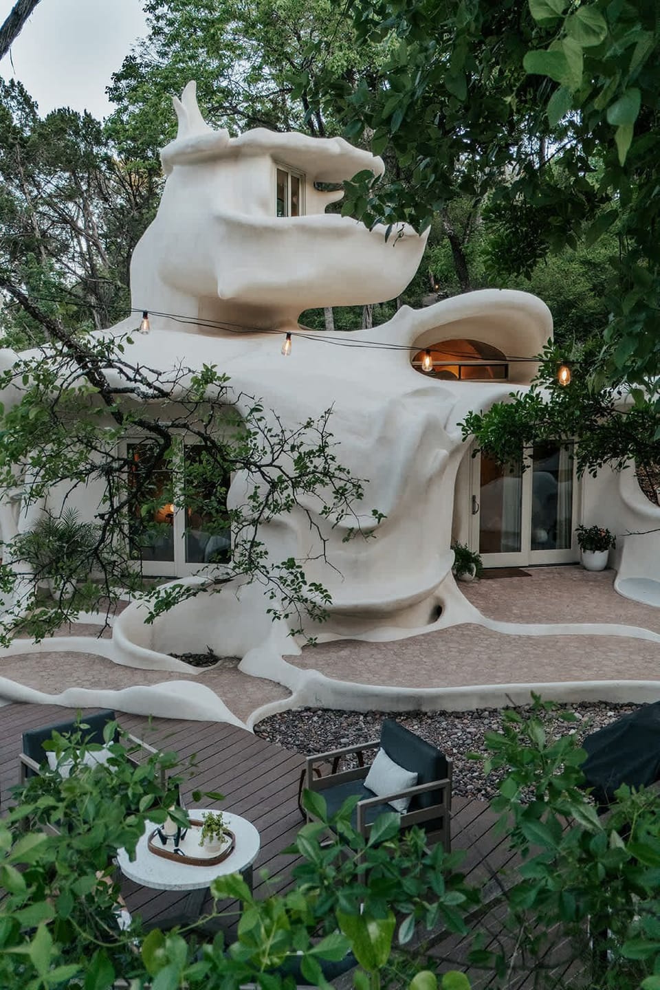 A full view of The Bloomhouse’s iconic, sculptural design and private outdoor living space.