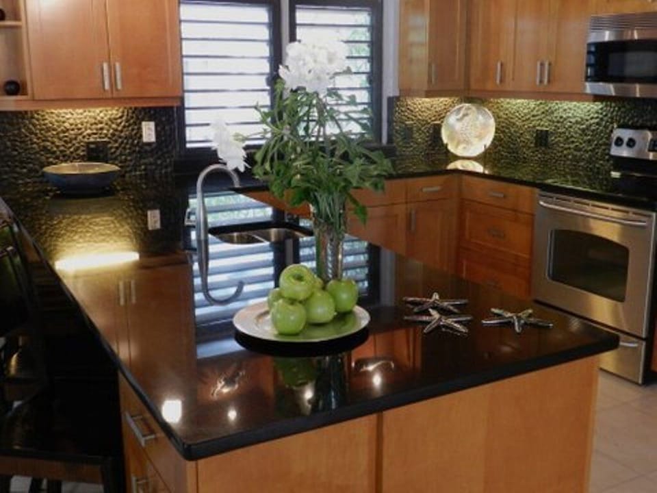 Gourmet kitchen, granite counters  stainless appliances, two sinks. Wine fridge