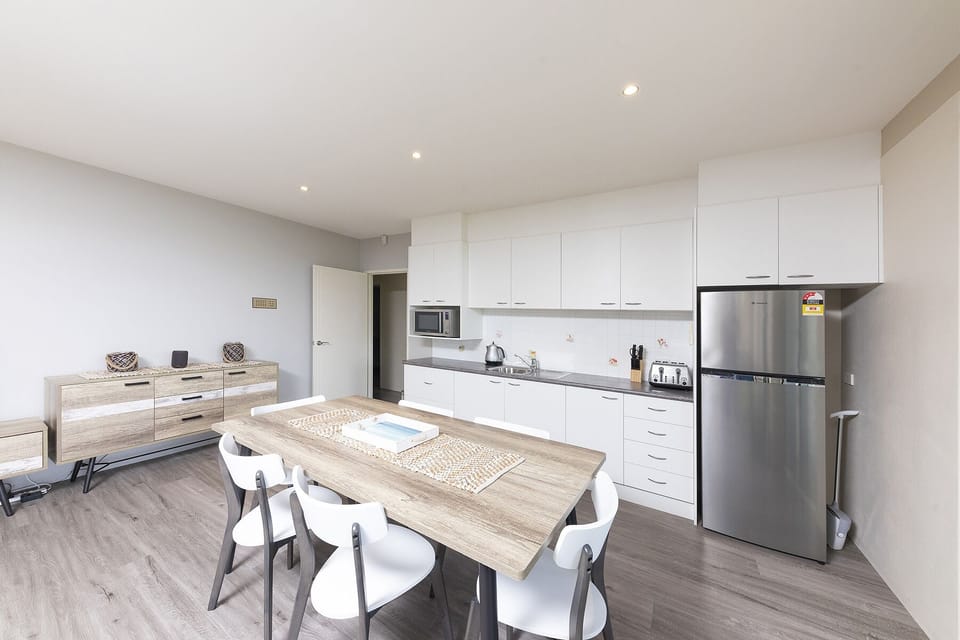 Lower level kitchenette, with convection microwave oven and fridge
