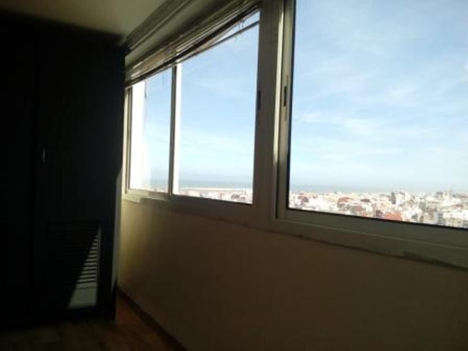 ocean and city view from the sofabed room