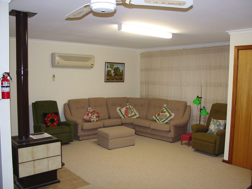 Lounge is part of spacious dining and kitchen area. Airy and well ventilated.