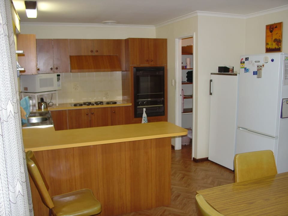 Kitchen and pantry have  large variety of utensils and cooking ingredients etc.