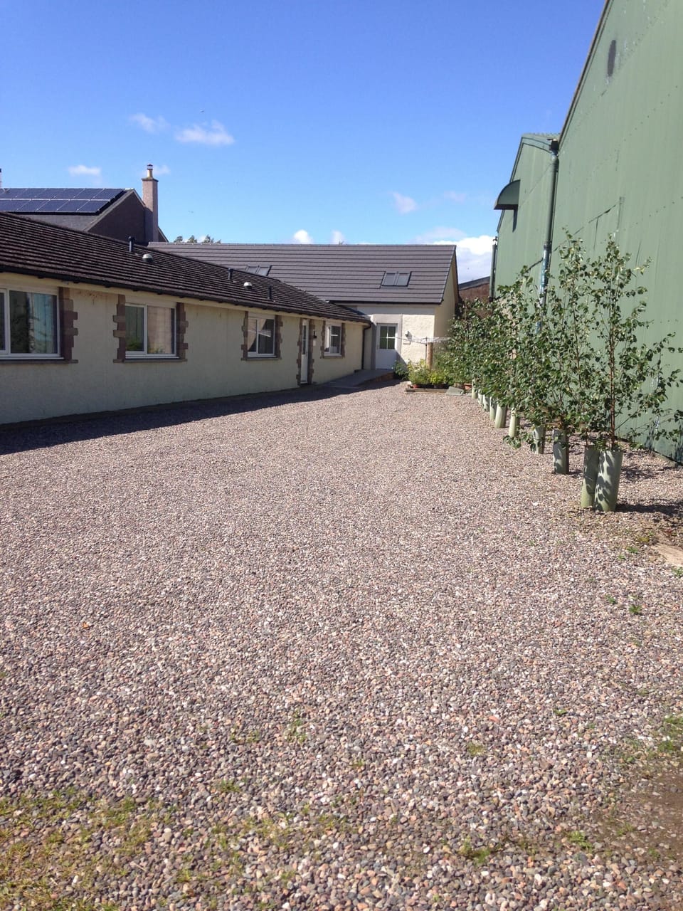 Gravel parking area for use by the cottages