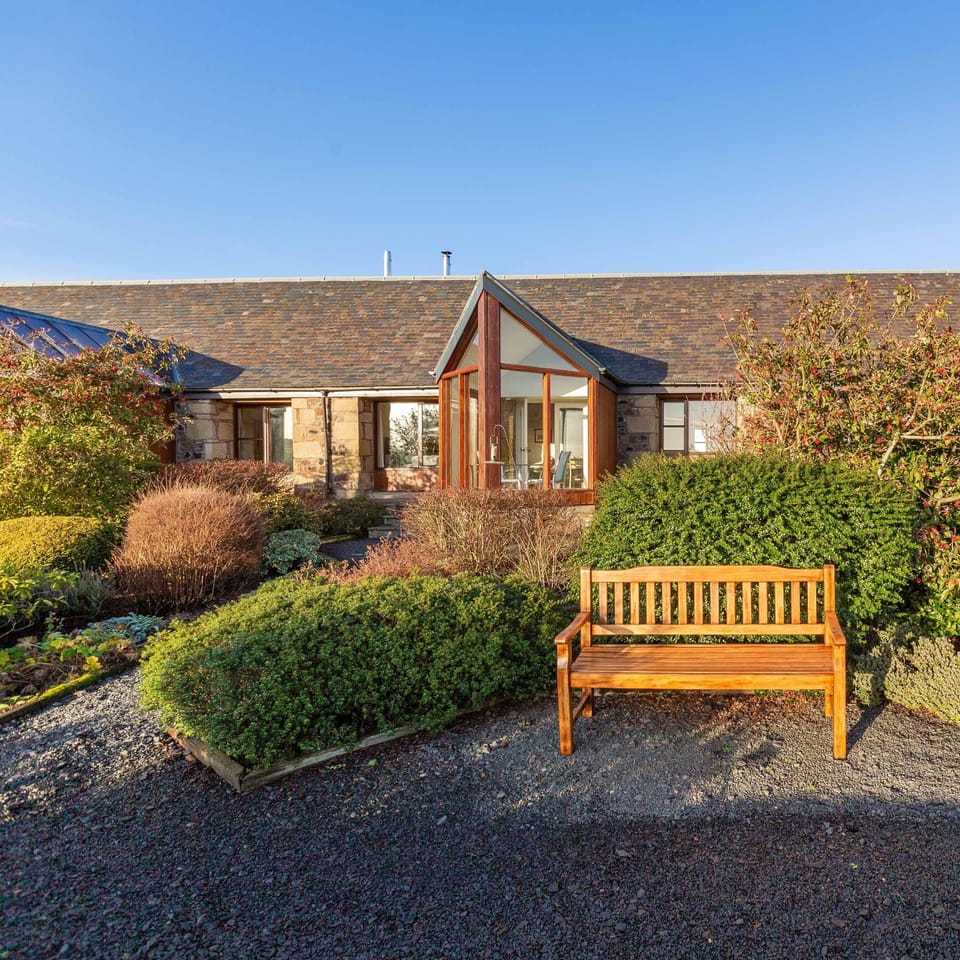 Admire the view from the cottage garden, 