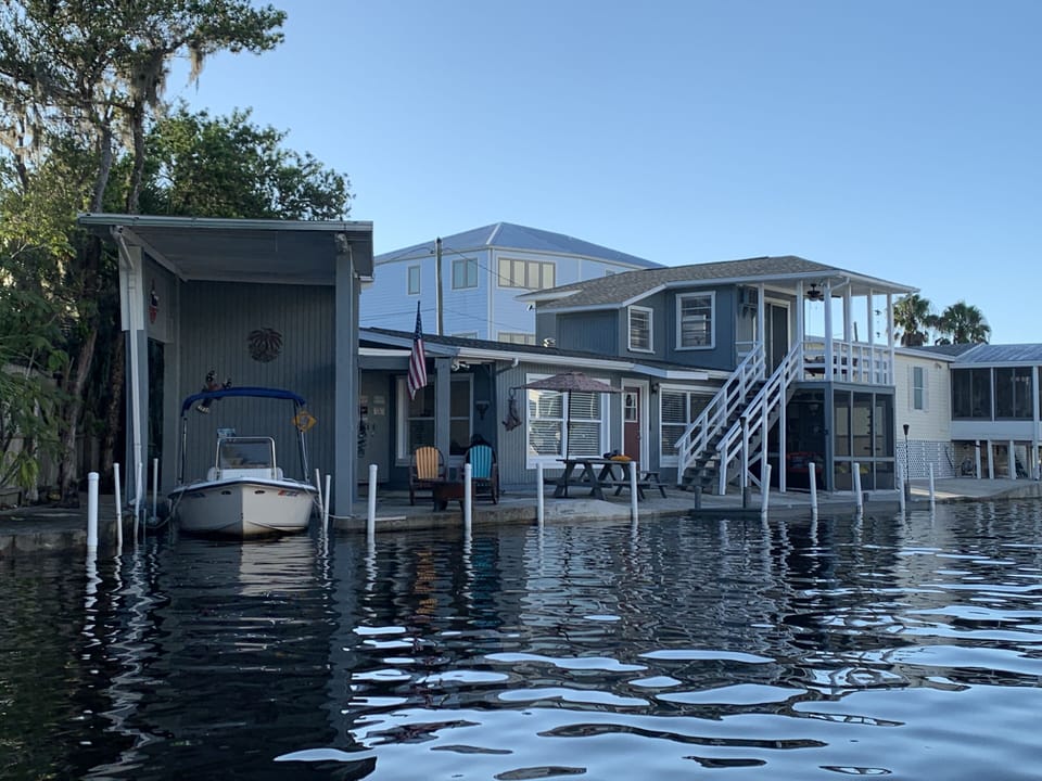Dock space for up to 30’ boat. Private ramp in neighborhood. Dock water/hose. 