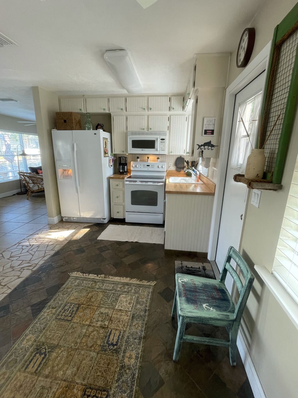 Fully stocked kitchen w/ full size oven, microwave, new fridge and dish washer.