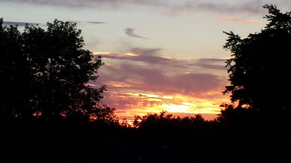 Sunset view from bay window in dining area 
