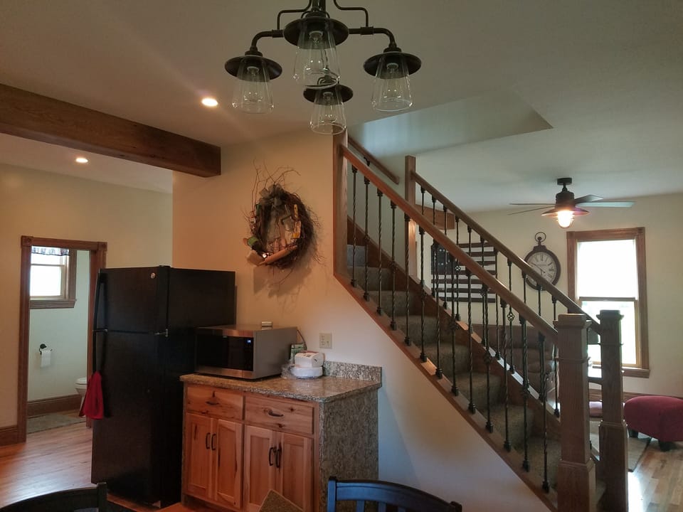 Open floor plan from kitchen/dining and living room. First floor 1/2 bath 