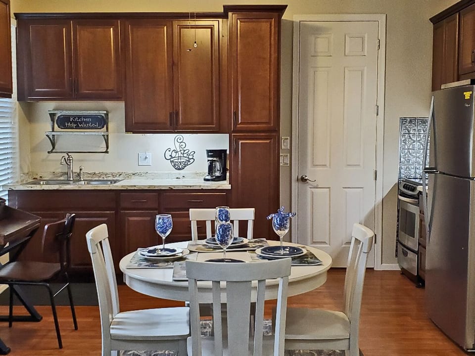 Double sinks, Oven stove top, Microwave, refrigerator, Keurig & Reg coffee mkr. 