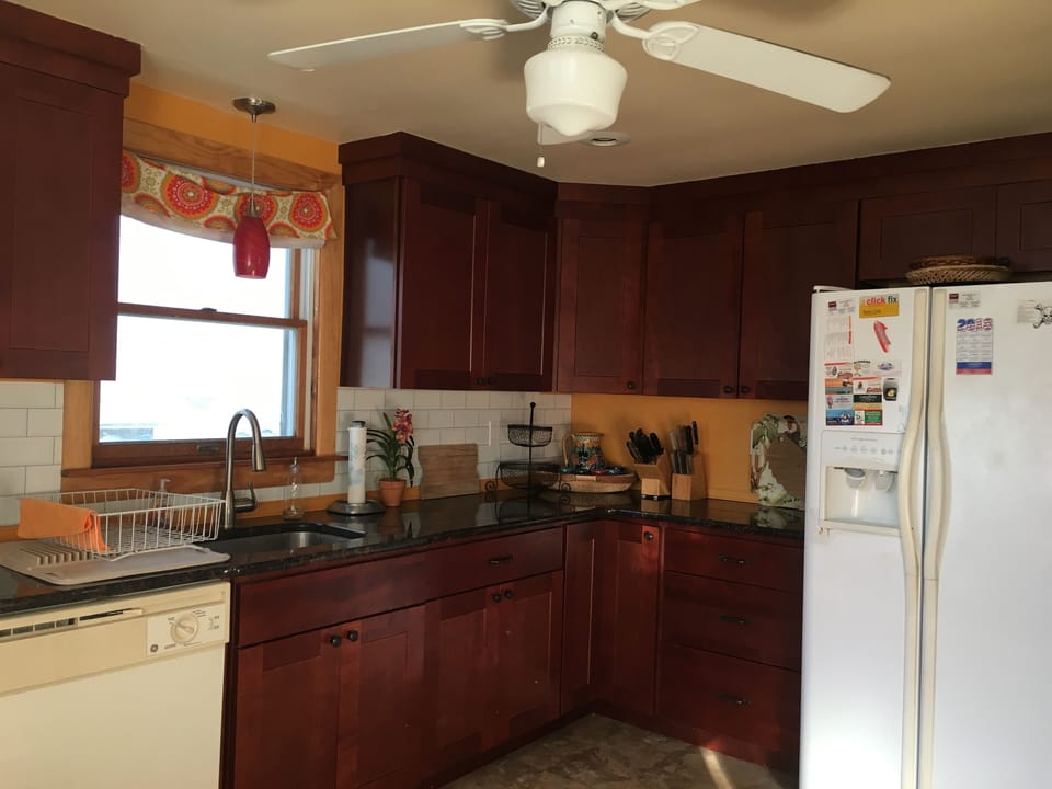 kitchen leading out to backyard & patio with plenty of seating!
