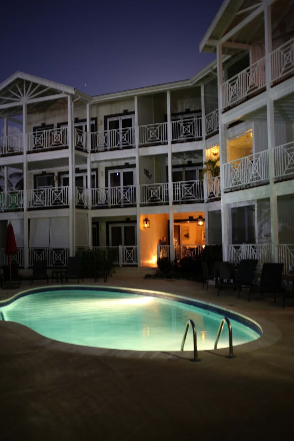 Pool is lit at night.