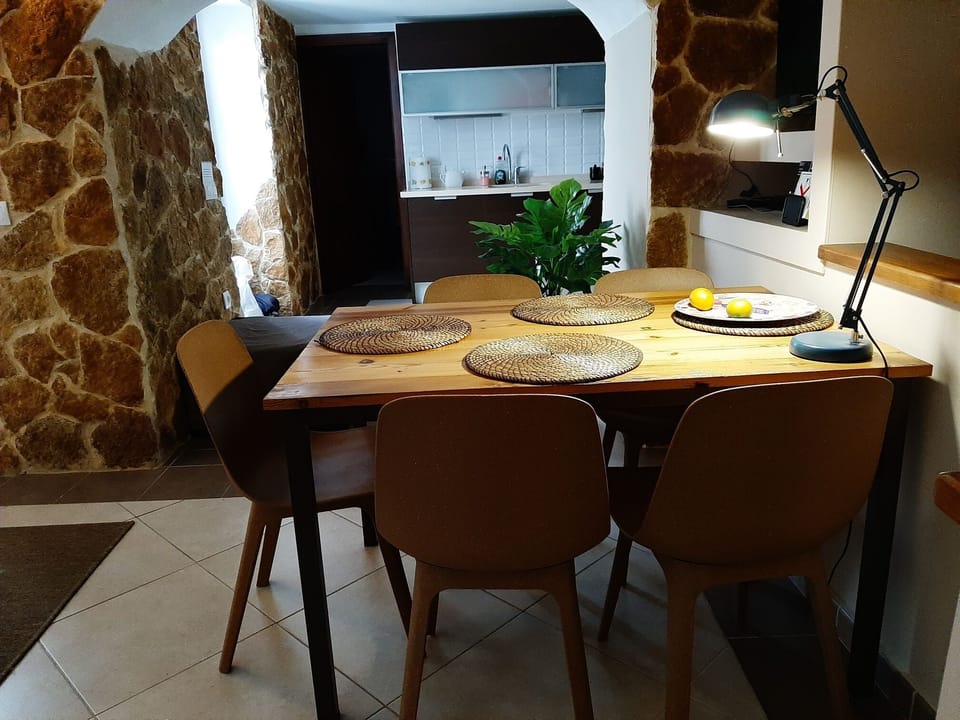 Kitchen direct attached to livingroom and own private  balcony