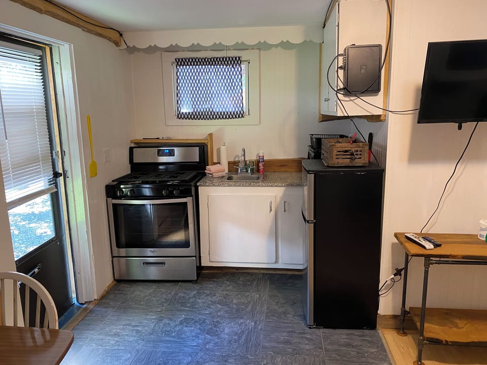 Kitchen - oven, fridge, microwave, dishes, silverware, basic pots and pans, etc.