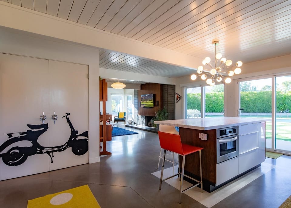 Open concept floor plan overlooking the backyard and pool