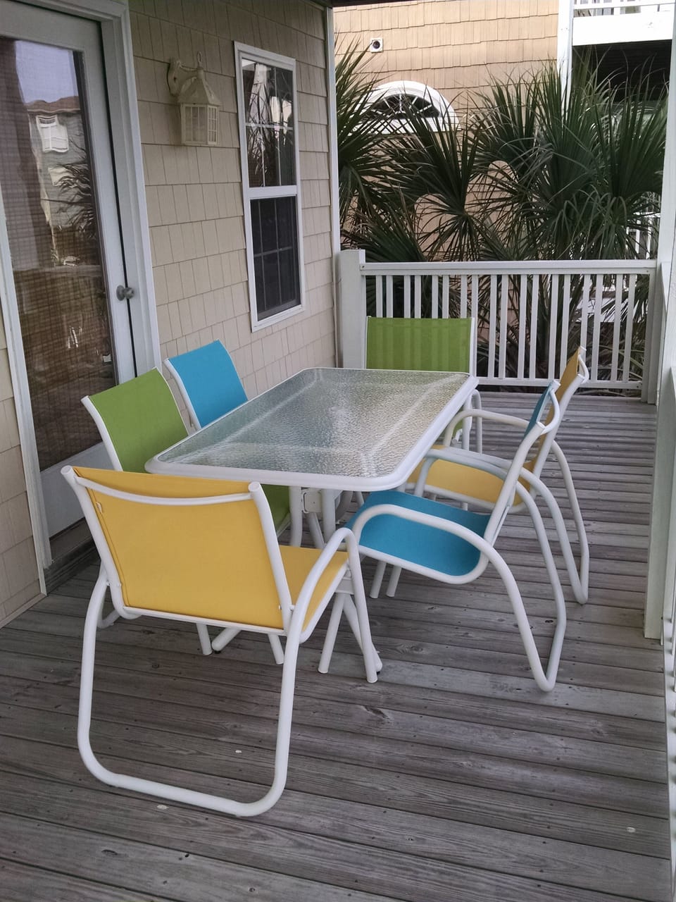 Outdoor eating and game area on back porch