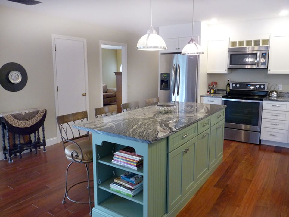 Updated Kitchen with Island and Bar Stools