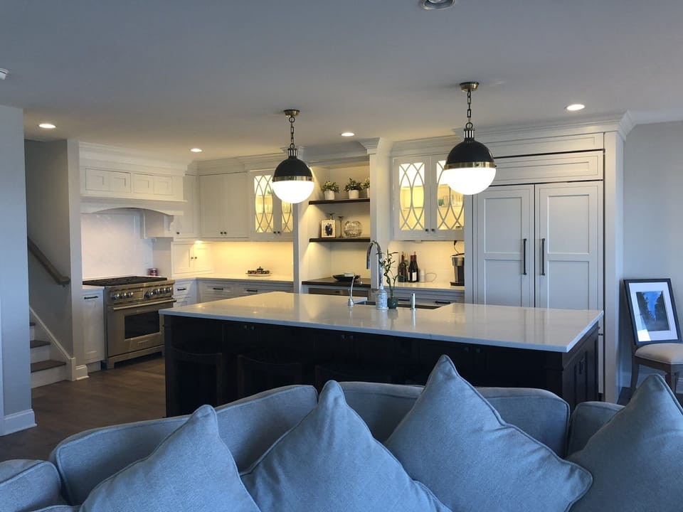 Huge kitchen island to gather around with comfy barstools 