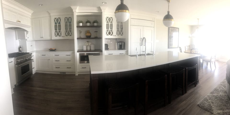 Why a sink in the island ? So the person washing dishes gets an ocean view! 🥰