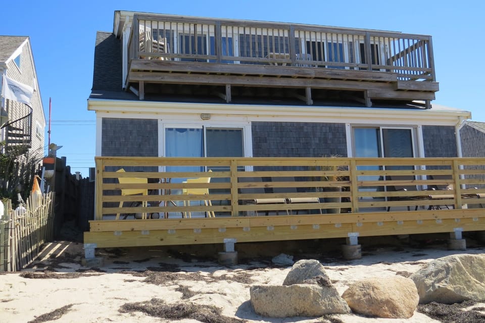 The deck is right on the sand so you can enjoy the salt air and the ocean.