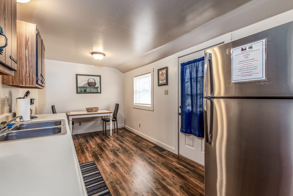 Updated kitchen, sparing none!  An extra dining table for a quiet cup of coffee.
