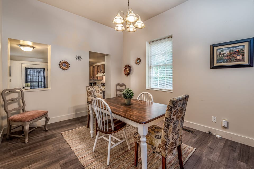 Darling dining area with historic feel and easy access to full kitchen.