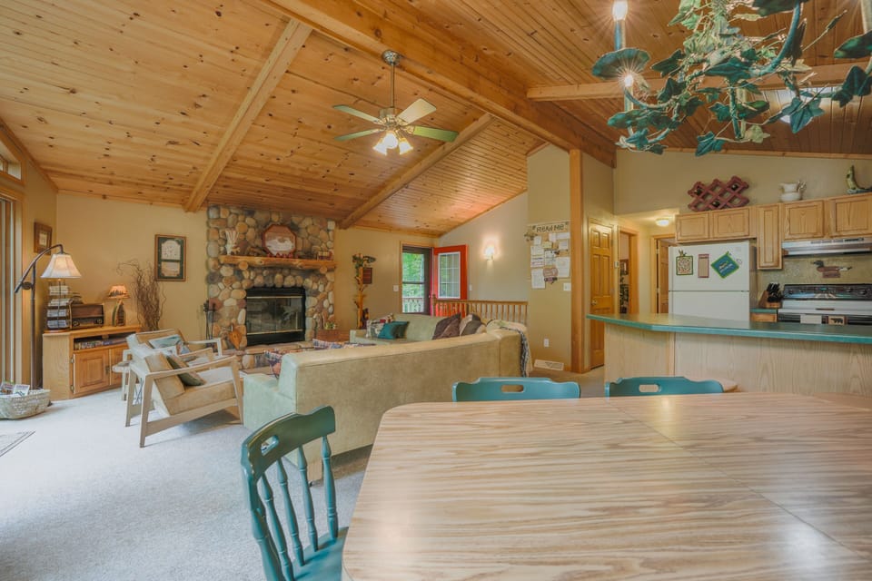 Natural firepit, entry and kitchen view from  table. 