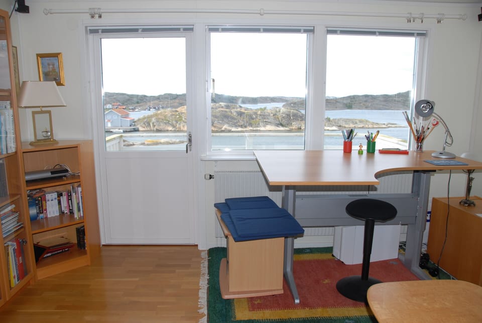 Computer desk up stairs. Looking out over second balcony and the ocean.