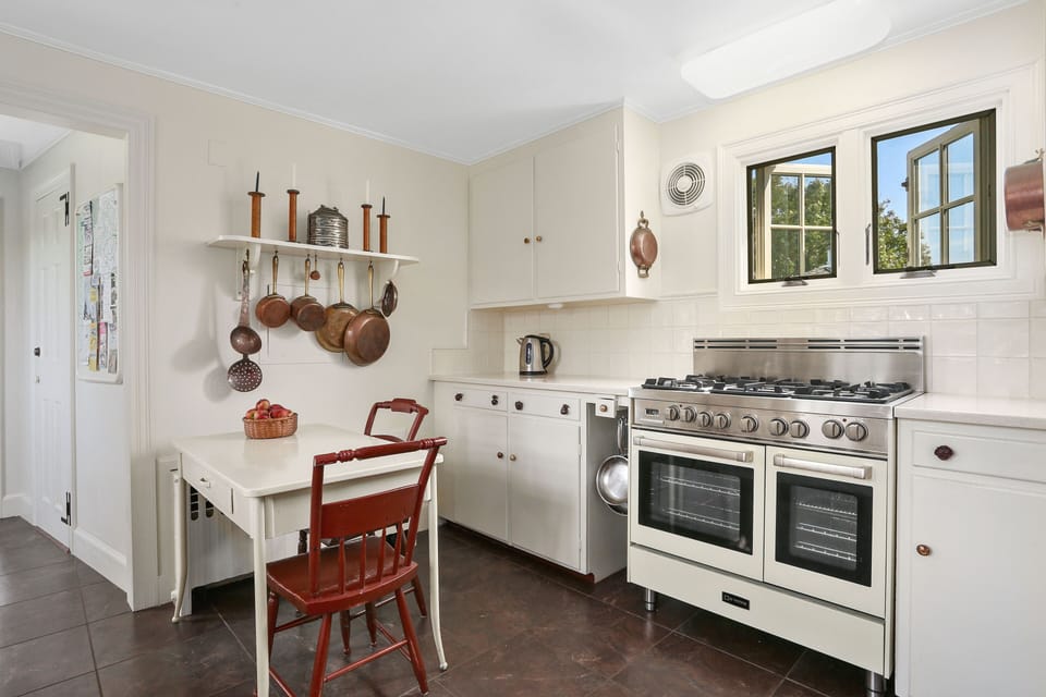 Kitchen with gas range and double electric oven