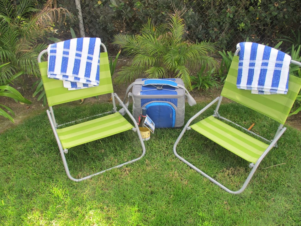 Beach chairs, towels, cooler and the first bottle of wine on us!