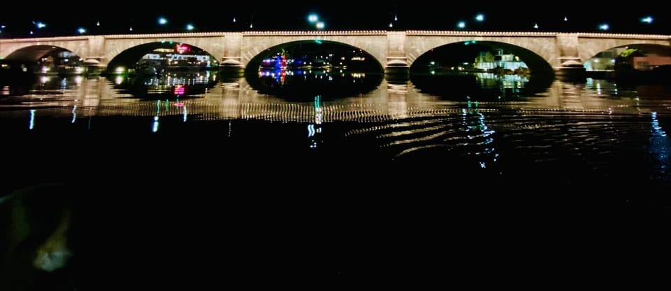 The London Bridge at night from the water