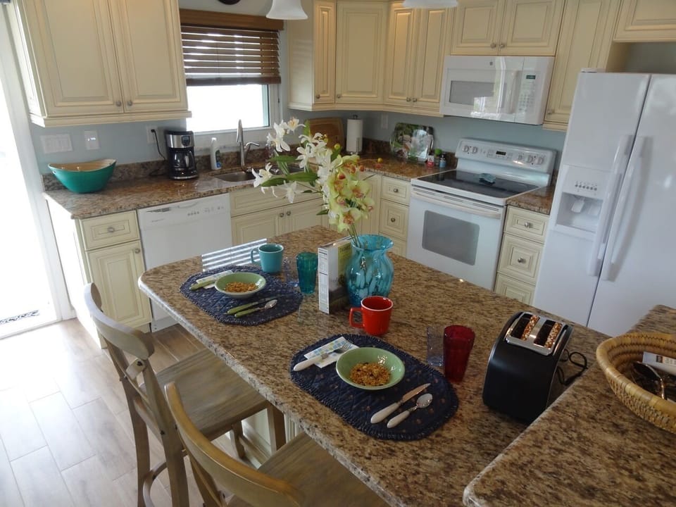 New cabinets, granite, and under cabinet lighting with dimmers.