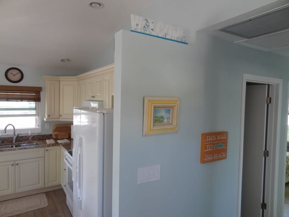 Entryway and kitchen.