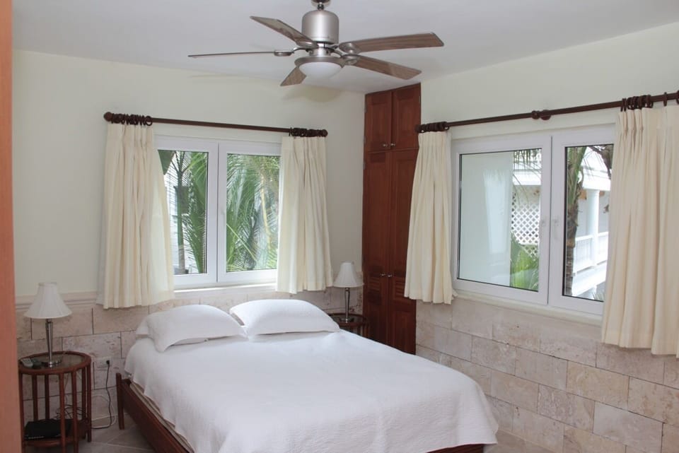 The second bedroom, in a quiet garden setting