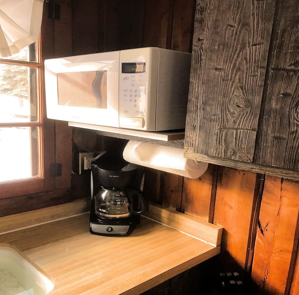 Microwave oven & 12 cup drip coffee maker.