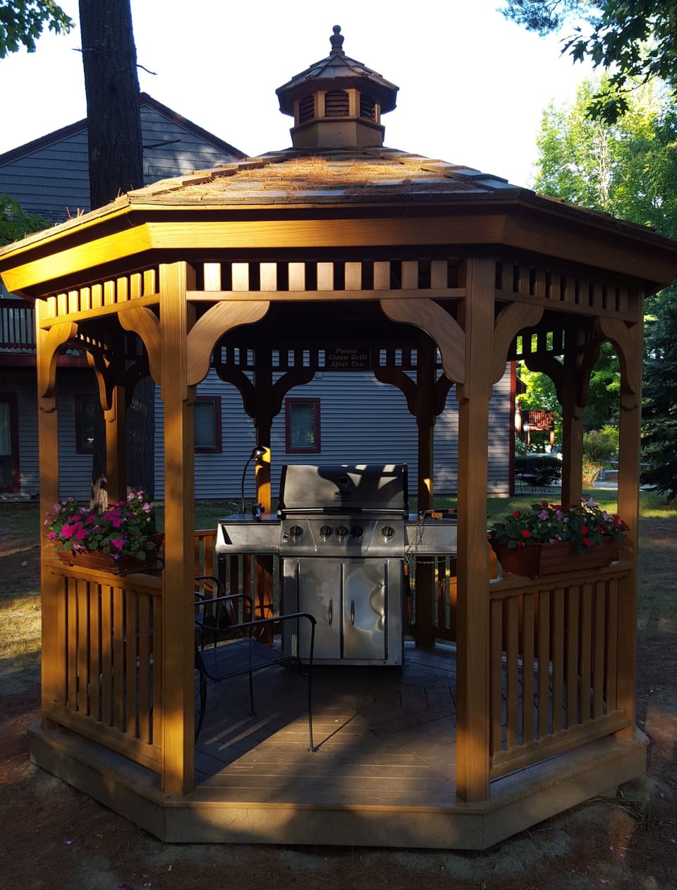 Next to the building is a covered gas grill for guest use.