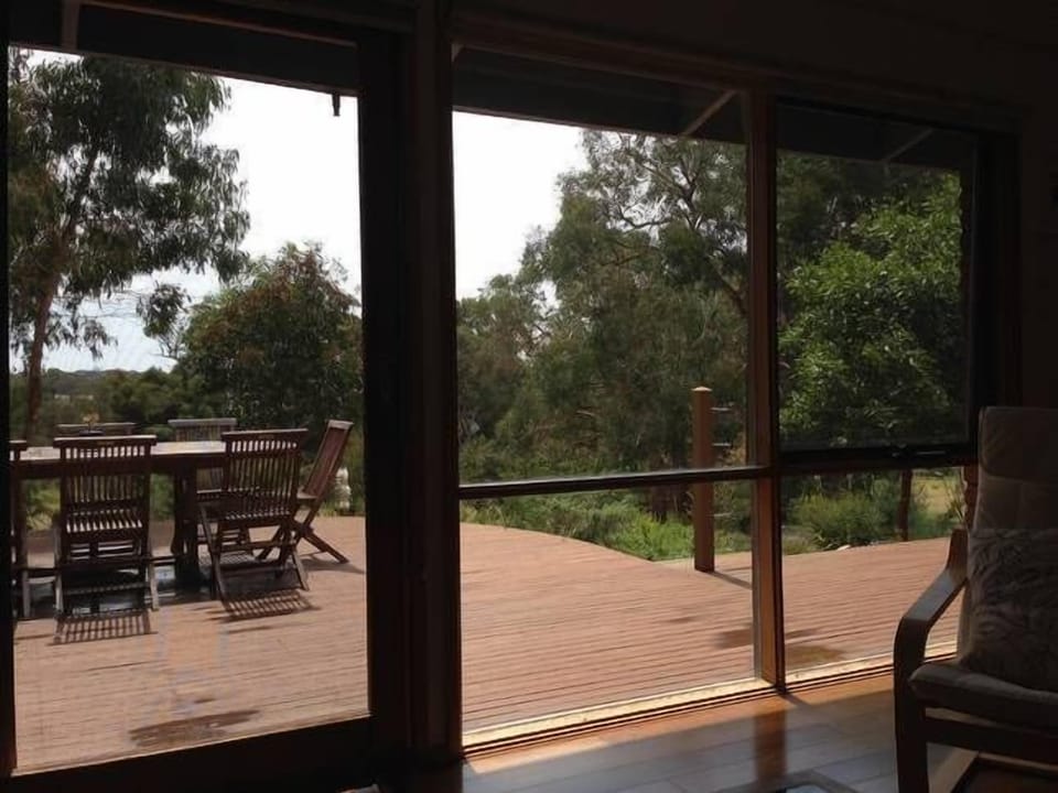 View from living room to deck and the bush