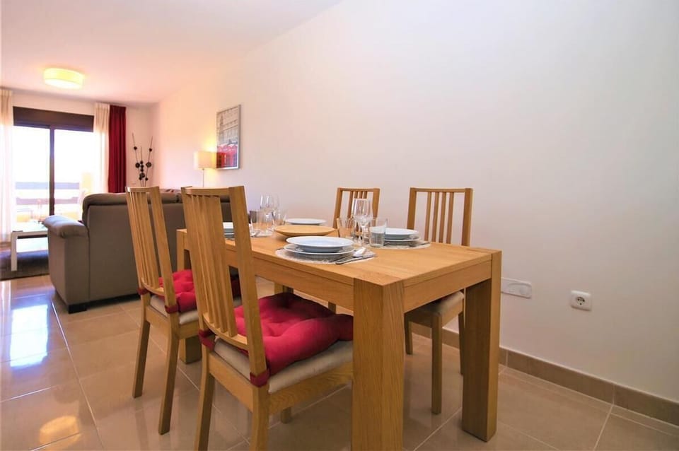 Modern dining area with seating for four guests