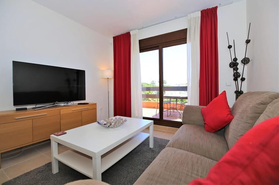 Modern lounge area with television and internet