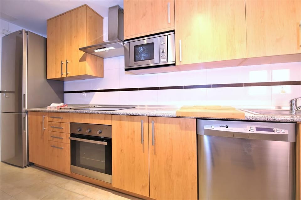 Kitchen is fully equipped with quality appliances