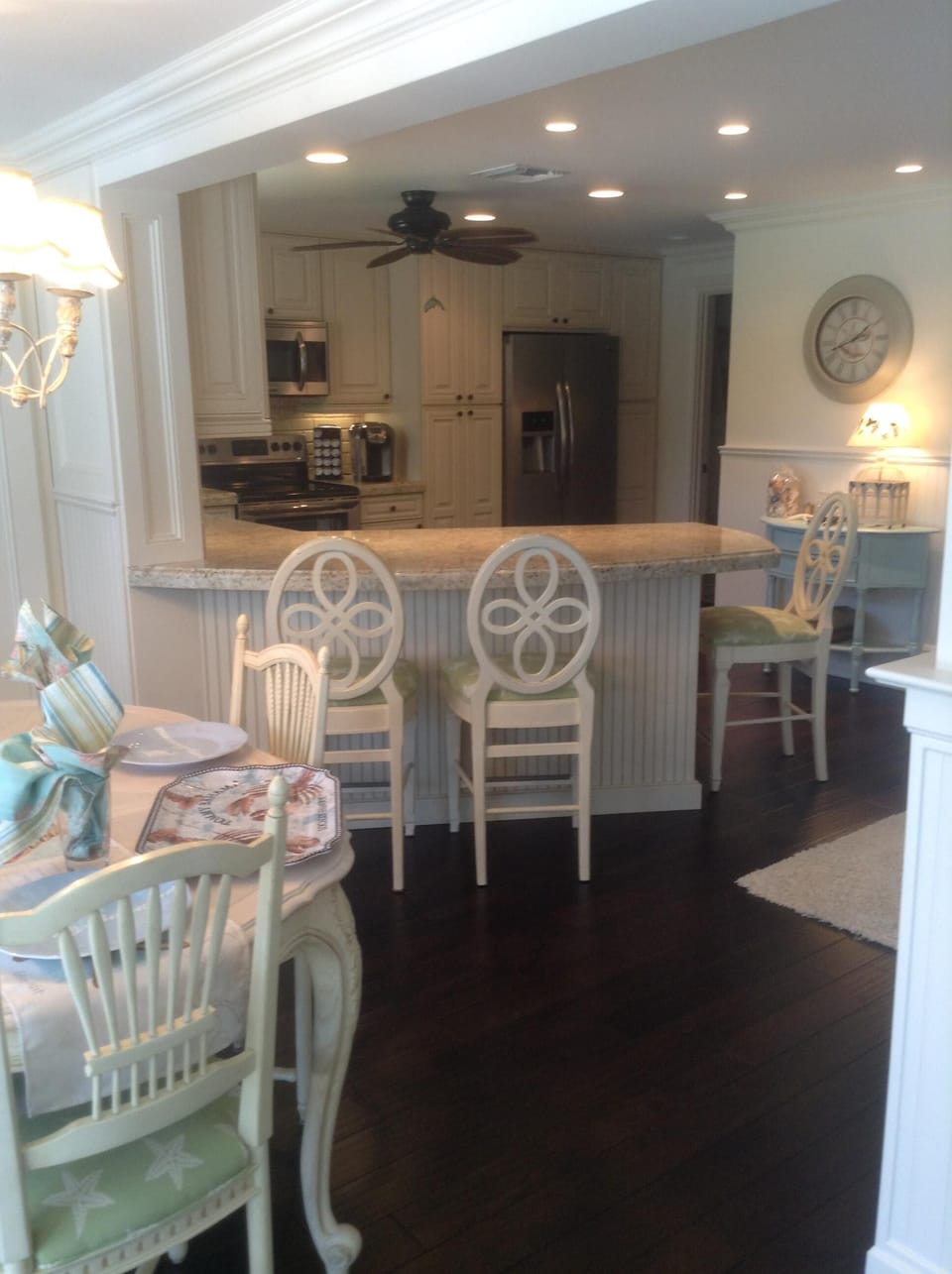 French inspired coastal dining area overlooking golf course and pool