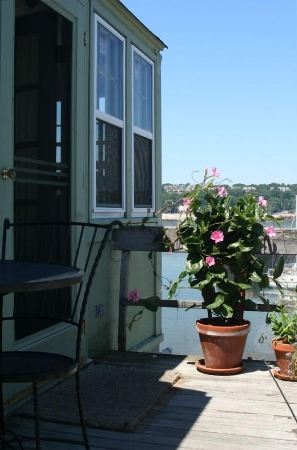 Deck with chairs for enjoying the panoramic harborviewx