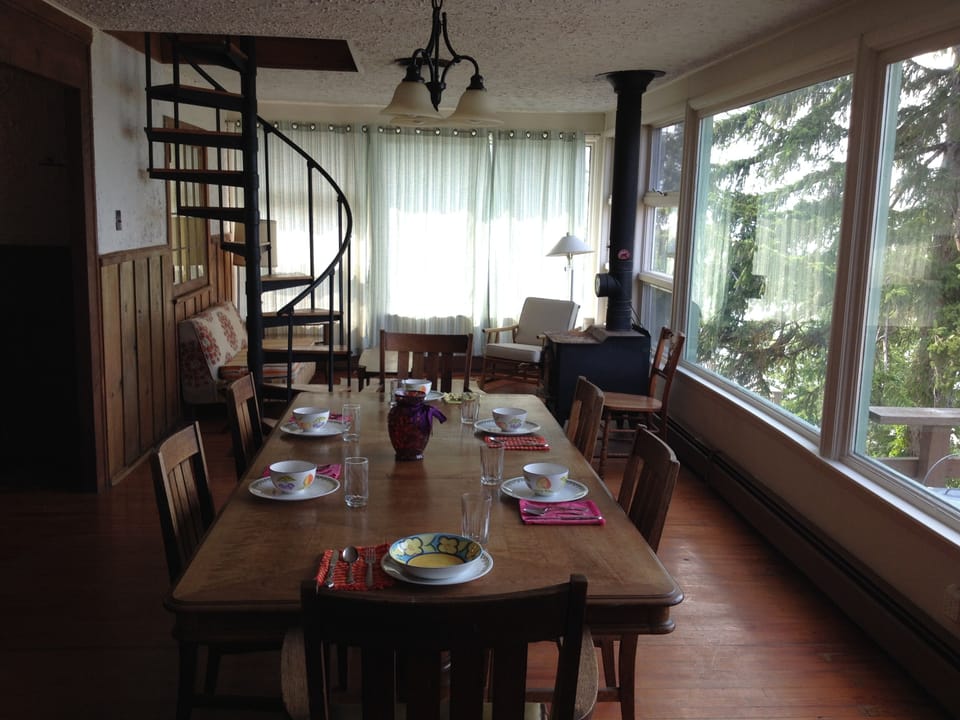 The dining room picture windows face majestic Lake Michigan.
