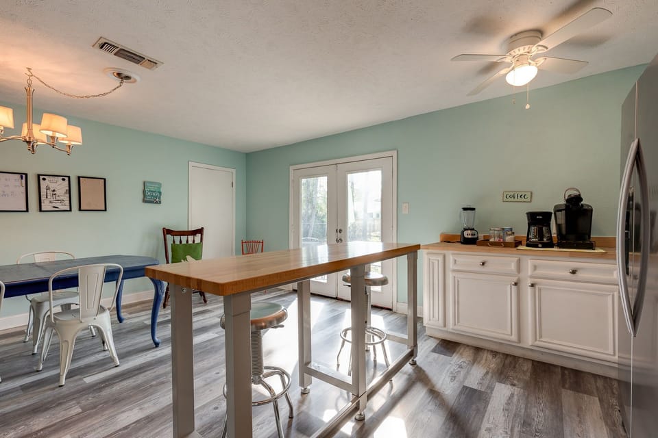 Kitchen dining facing patio 