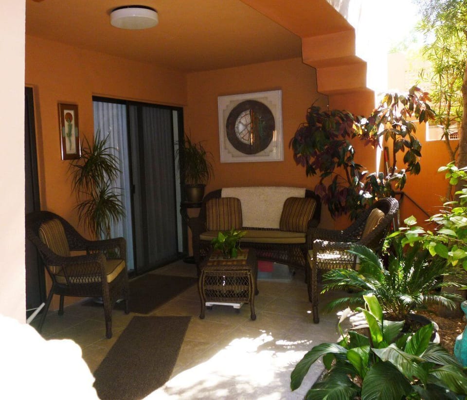 side patio with access from master bedroom and living room